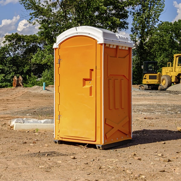 how often are the portable restrooms cleaned and serviced during a rental period in Pioneer Junction